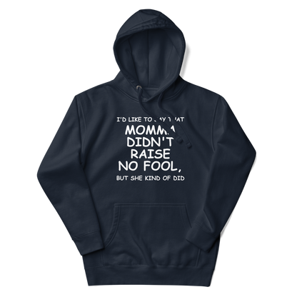 "I'd like to say that momma didn't raise no fool, but she kind of did" printed on a navy blazer unisex hoodie laying on a flat surface with the hood up