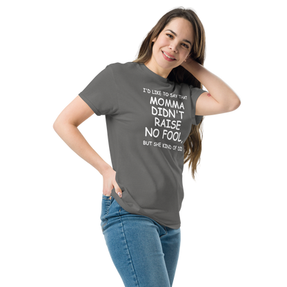 "I'd like to say that momma didn't raise no fool, but she kind of did" printed on a charcoal unisex classic tee worn by a female