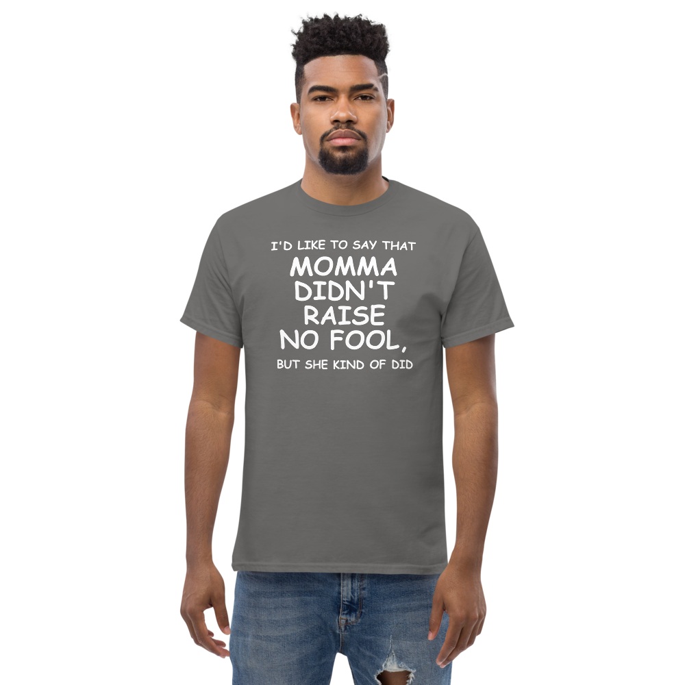 "I'd like to say that momma didn't raise no fool, but she kind of did" printed on a charcoal unisex classic tee worn by a male