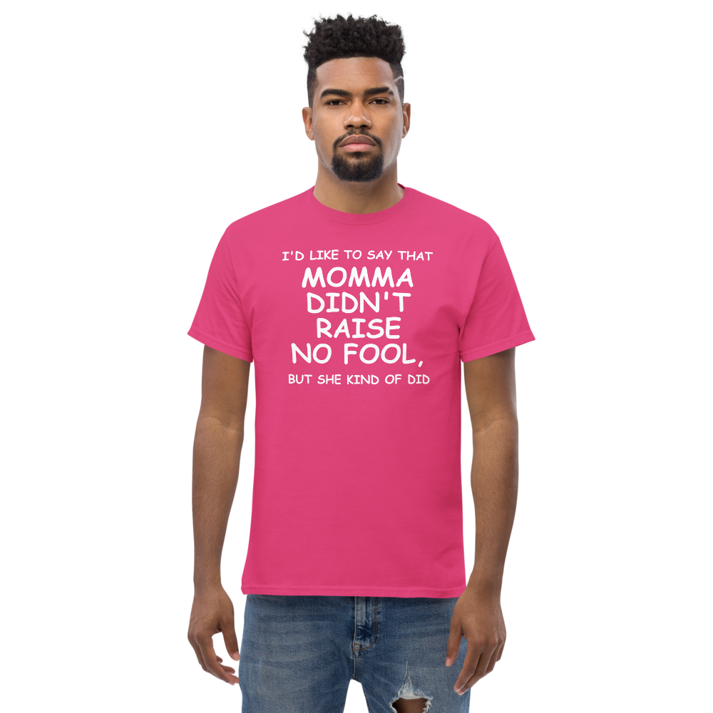 "I'd like to say that momma didn't raise no fool, but she kind of did" printed on a heliconia unisex classic tee worn by a male