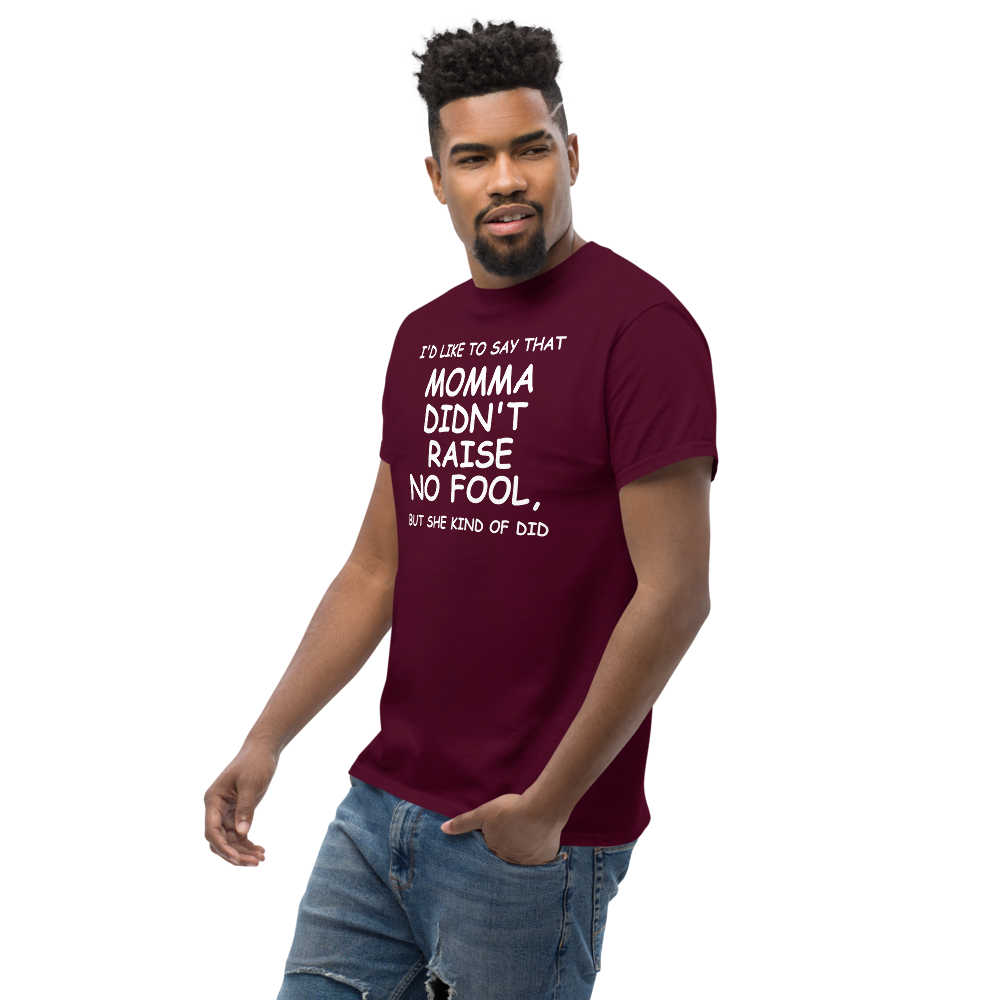 "I'd like to say that momma didn't raise no fool, but she kind of did" printed on a maroon unisex classic tee worn by a male