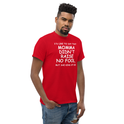 "I'd like to say that momma didn't raise no fool, but she kind of did" printed on a red unisex classic tee worn by a male