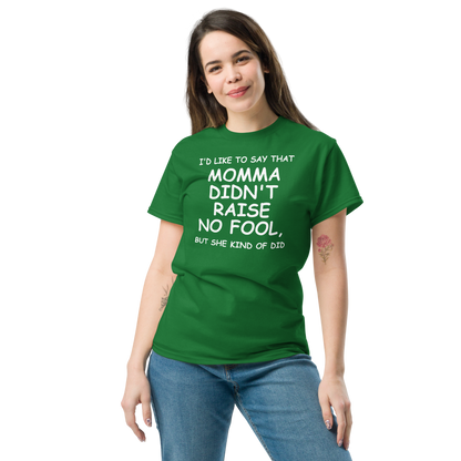 "I'd like to say that momma didn't raise no fool, but she kind of did" printed on a turf green unisex classic tee worn by a female