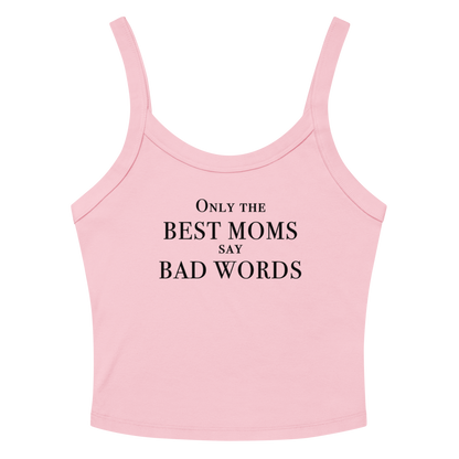 "Only the best moms say bad words" printed on a solid pink blend women's micro-rib tanktop laying on a flat surface amongst sunglasses and shorts