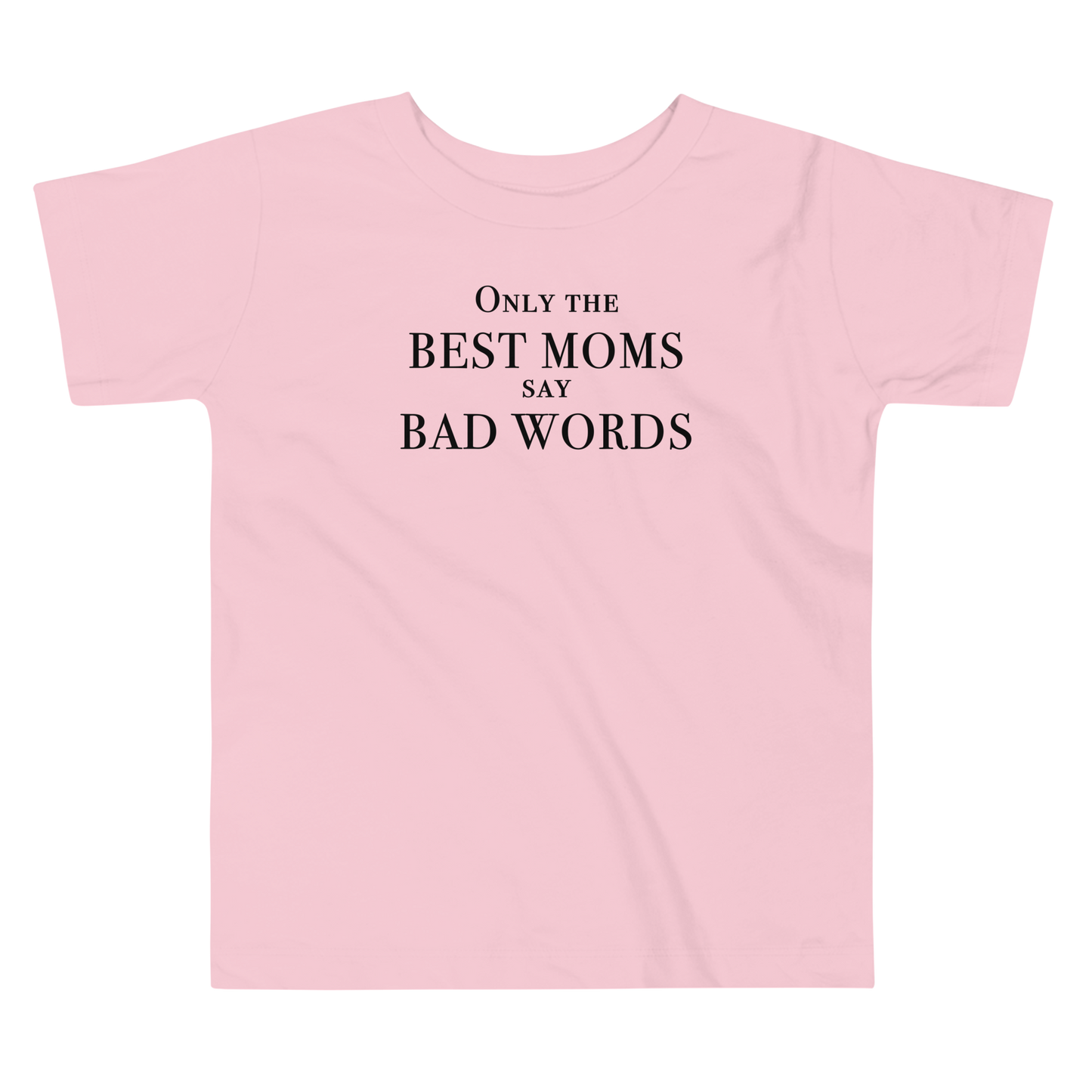 "Only the best moms say bad words" printed on a pink toddler short sleeve tee laying on a flat surface