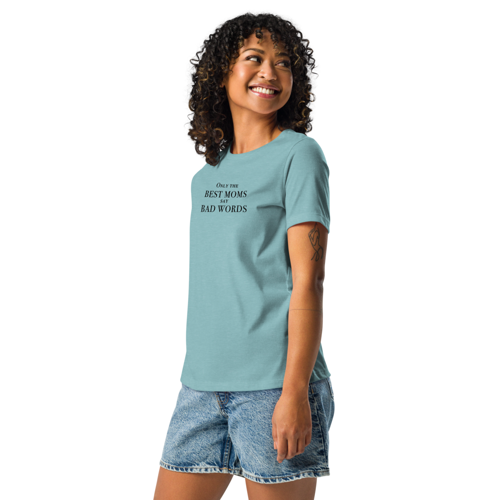 "Only the best moms say bad words" printed on a heather blue lagoon women's relaxed t-shirt worn by a female
