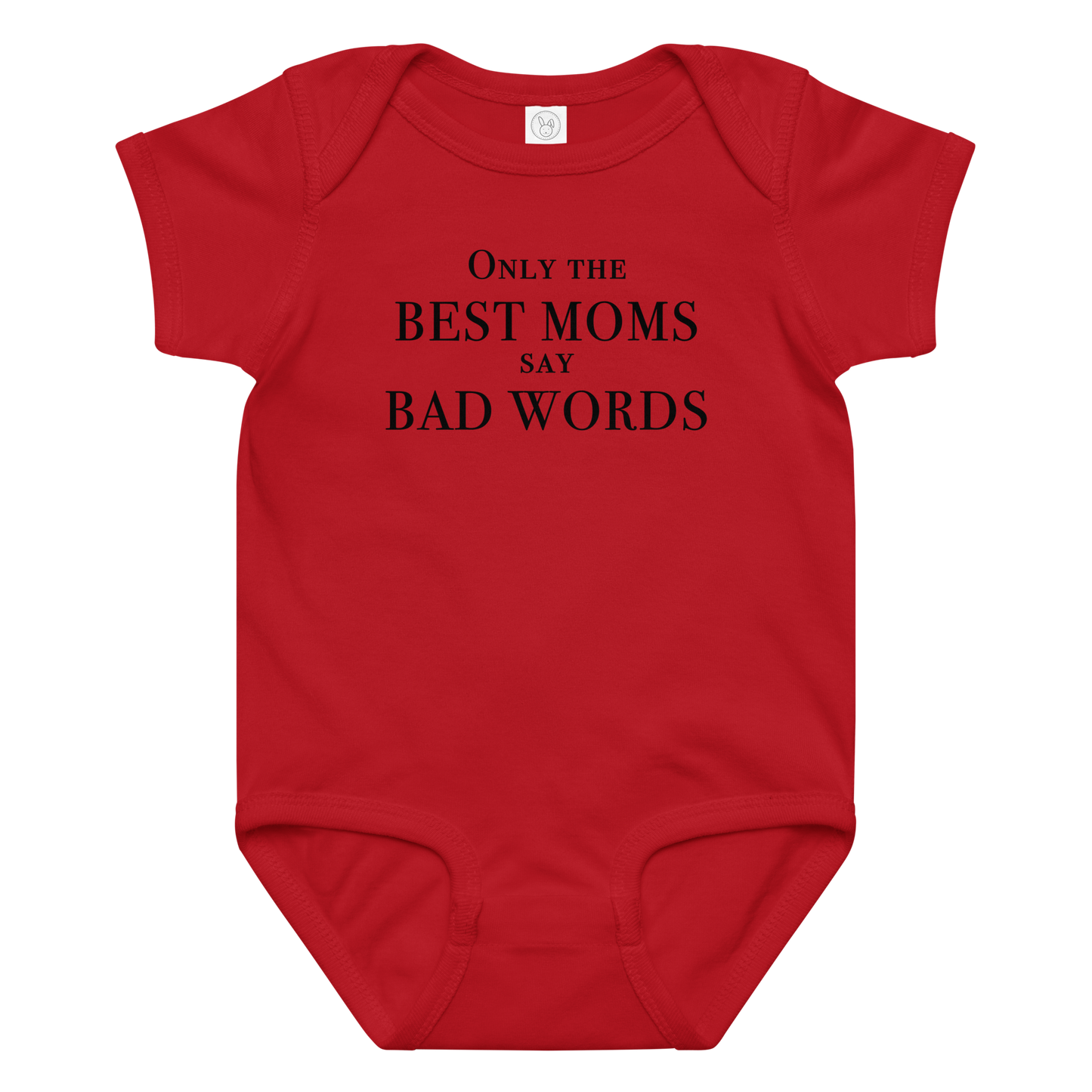 "Only the best moms say bad words" printed on a red baby jersey bodysuit laying on a flat surface amongst other clothes