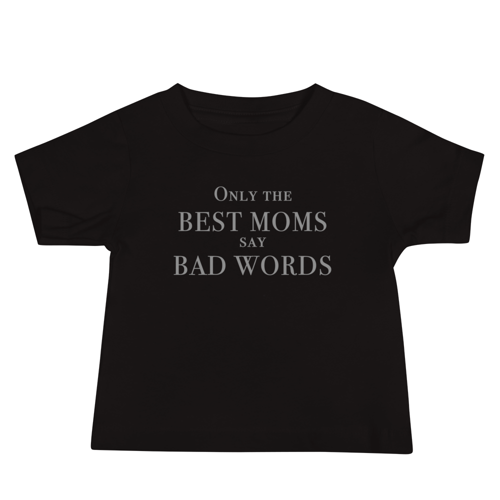 "Only the best moms say bad words" printed on a black baby jersey short sleeve tee laying on a flat surface