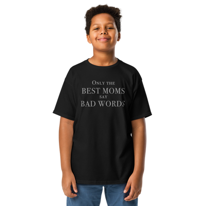 "Only the best moms say bad words" printed on a black youth classic tee worn by a male