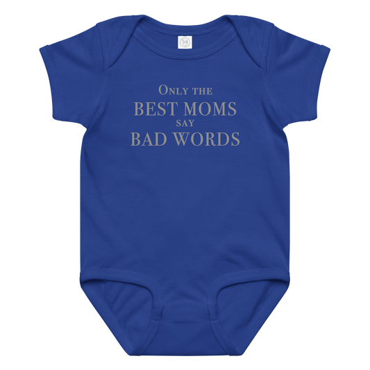 "Only the best moms say bad words" printed on a royal baby jersey bodysuit laying on a flat surface amongst other clothes