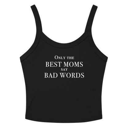 "Only the best moms say bad words" printed on a solid black blend women's micro-rib tanktop laying on a flat surface amongst sunglasses and shorts