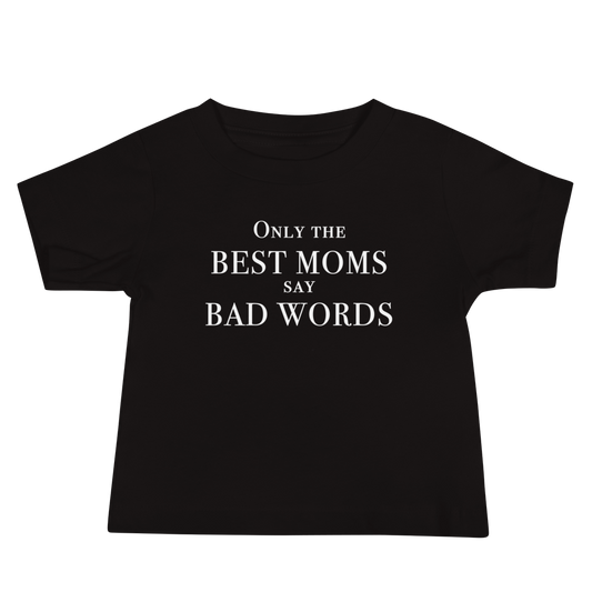 "Only the best moms say bad words" printed on a black baby jersey short sleeve tee laying on a flat surface