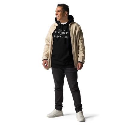 "Only the best moms say bad words" printed on a black unisex hoodie worn by a male with a jacket on top