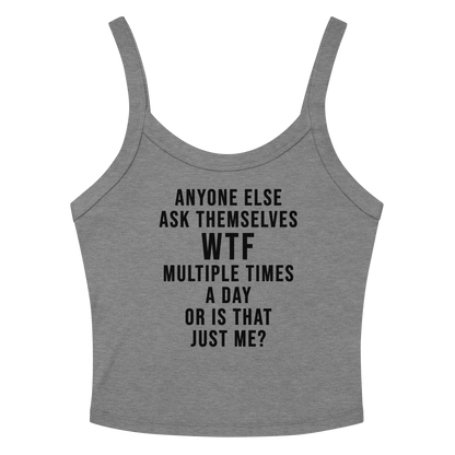 "Anyone else ask themselves WTF multiple times a day or is that just me?" printed on a athletic heather women's micro-rib tanktop laying on a flat surface amongst sunglasses and shorts