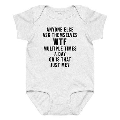"Anyone else ask themselves WTF multiple times a day or is that just me?" printed on a ash baby jersey bodysuit laying on a flat surface amongst other clothes