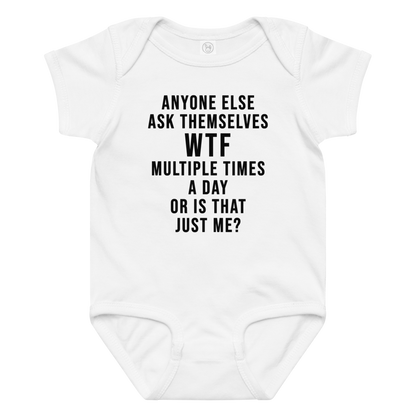 "Anyone else ask themselves WTF multiple times a day or is that just me?" printed on a white baby jersey bodysuit laying on a flat surface amongst other clothes