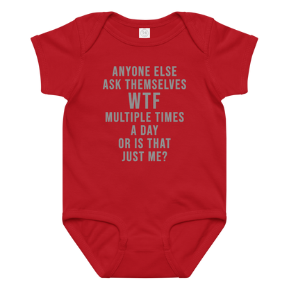 "Anyone else ask themselves WTF multiple times a day or is that just me?" printed on a red baby jersey bodysuit laying on a flat surface amongst other clothes