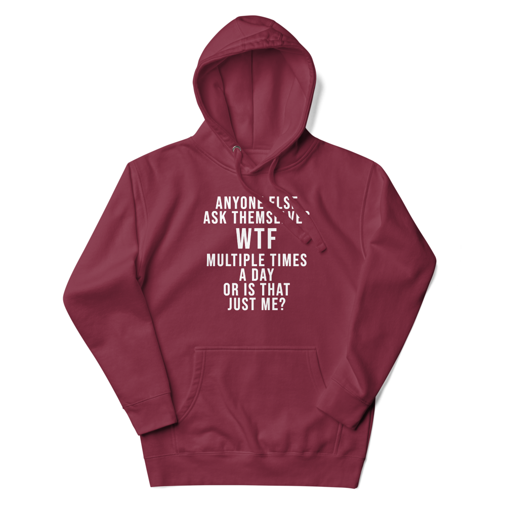 "Anyone else ask themselves WTF multiple times a day or is that just me?" printed on a maroon unisex hoodie laying on a flat surface with the hood up