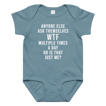 "Anyone else ask themselves WTF multiple times a day or is that just me?" printed on a vintage indigo baby jersey bodysuit laying on a flat surface amongst other clothes