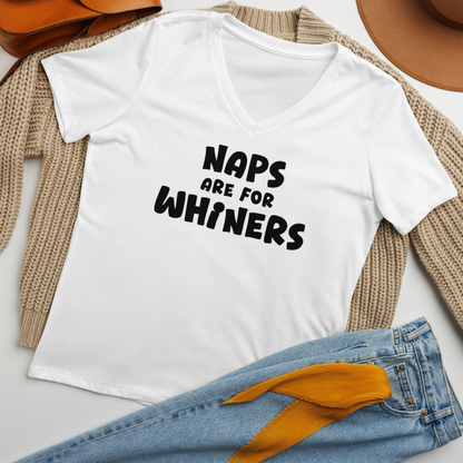 "Naps Are For Whiners" printed on a solid white blend women's relaxed v-neck t-shirt laying on a flat surface amongst other clothes
