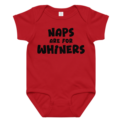"Naps Are For Whiners" printed on a red baby jersey bodysuit laying on a flat surface amongst other clothes