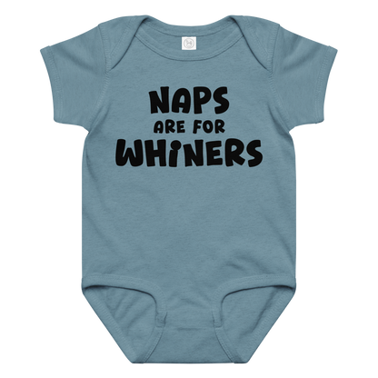 "Naps Are For Whiners" printed on a vintage indigo baby jersey bodysuit laying on a flat surface amongst other clothes