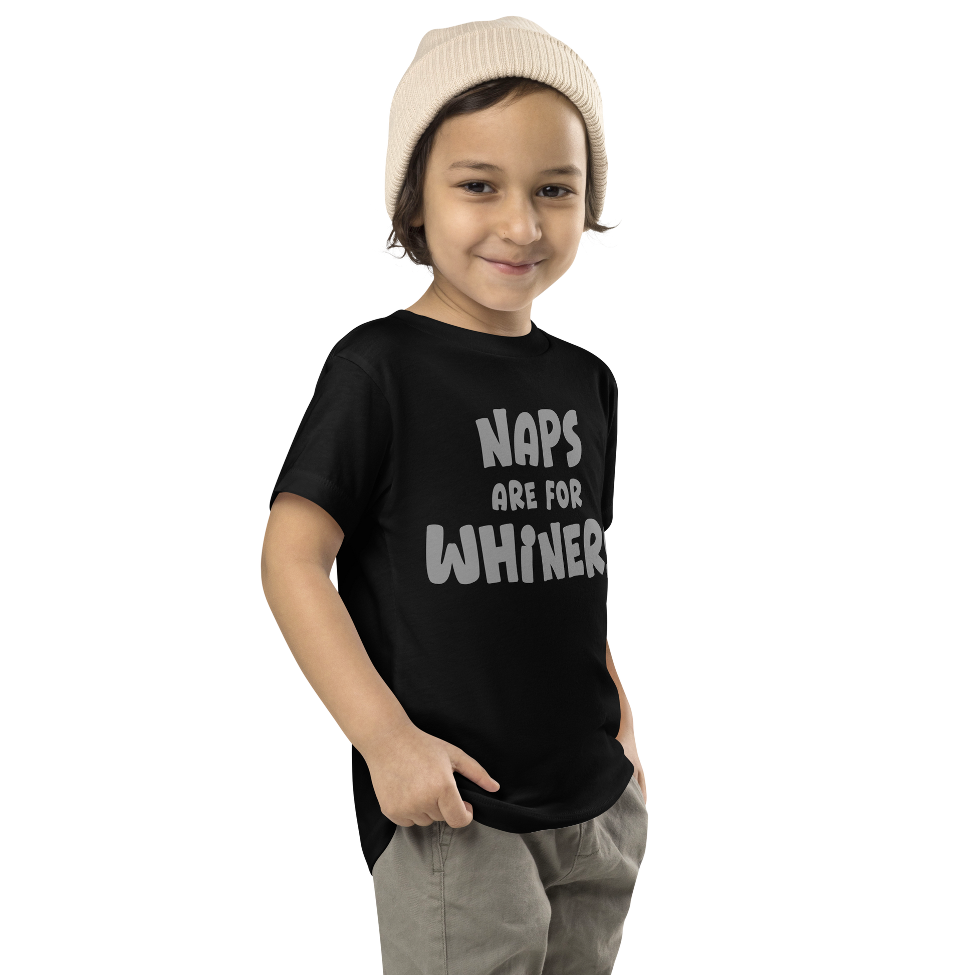 "Naps Are For Whiners" printed on a black toddler short sleeve tee worn by a male who is also wearing a knit cap