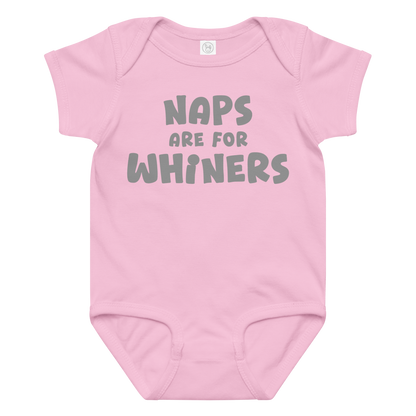 "Naps Are For Whiners" printed on a pink baby jersey bodysuit laying on a flat surface amongst other clothes