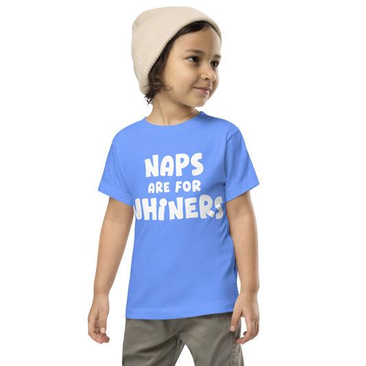 "Naps Are For Whiners" printed on a heather columbia blue toddler short sleeve tee worn by a male wearing a cap