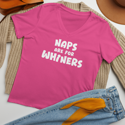 "Naps Are For Whiners" printed on a berry women's relaxed v-neck t-shirt laying on a flat surface amongst other clothes