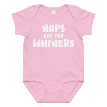 "Naps Are For Whiners" printed on a pink baby jersey bodysuit laying on a flat surface amongst other clothes