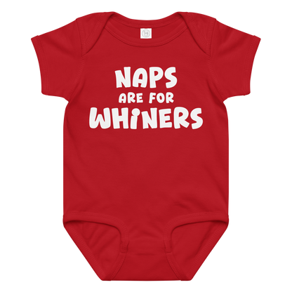 "Naps Are For Whiners" printed on a red baby jersey bodysuit laying on a flat surface amongst other clothes