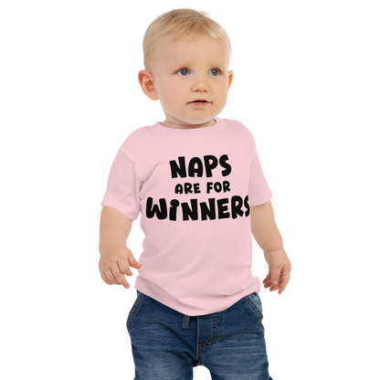 "Naps Are For Winners" printed on a pink baby jersey short sleeve tee worn by a male