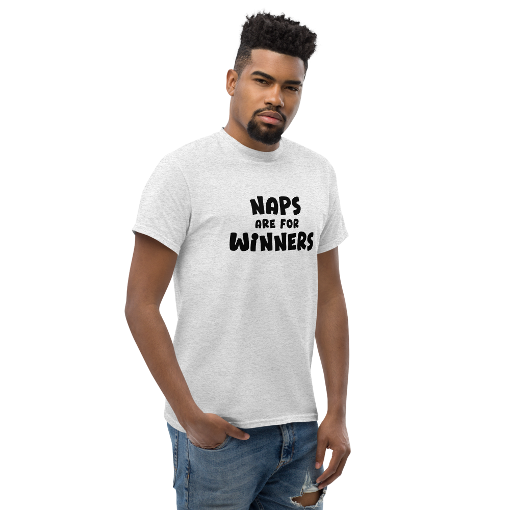 "Naps Are For Winners" printed on a ash unisex classic tee worn by a male