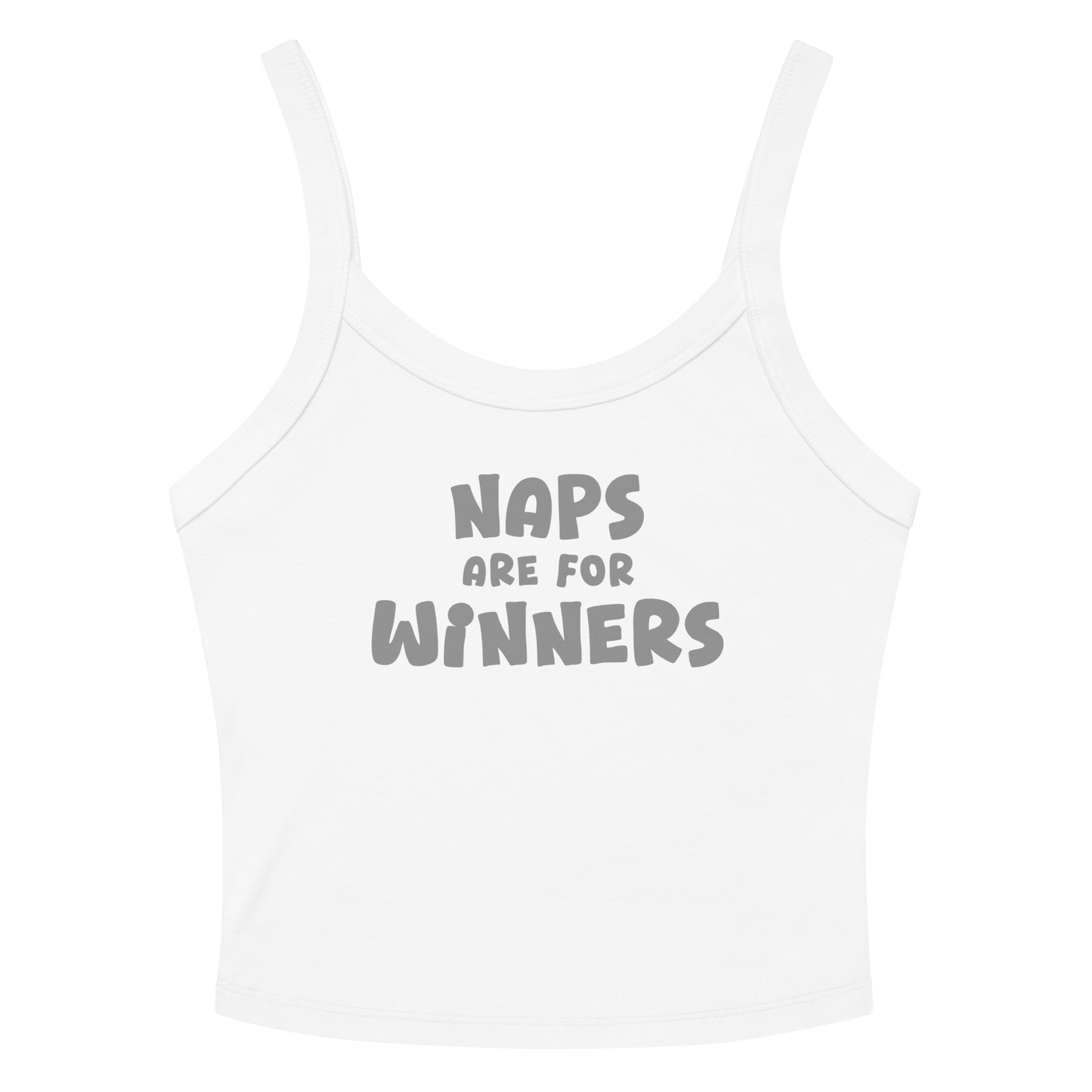 "Naps Are For Winners" printed on a solid white blend women's micro-rib tanktop laying on a flat surface amongst sunglasses and shorts