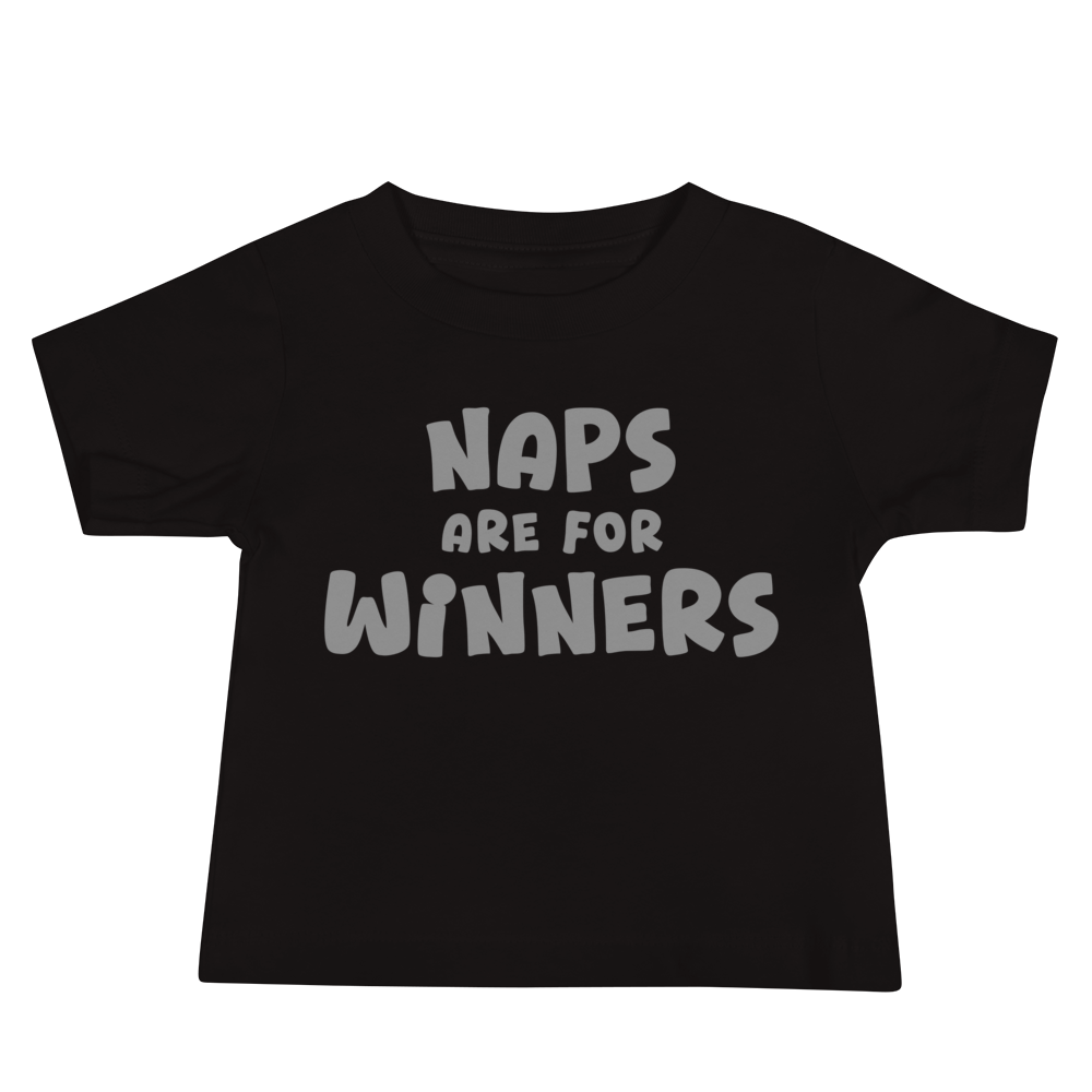 "Naps Are For Winners" printed on a black baby jersey short sleeve tee laying on a flat surface