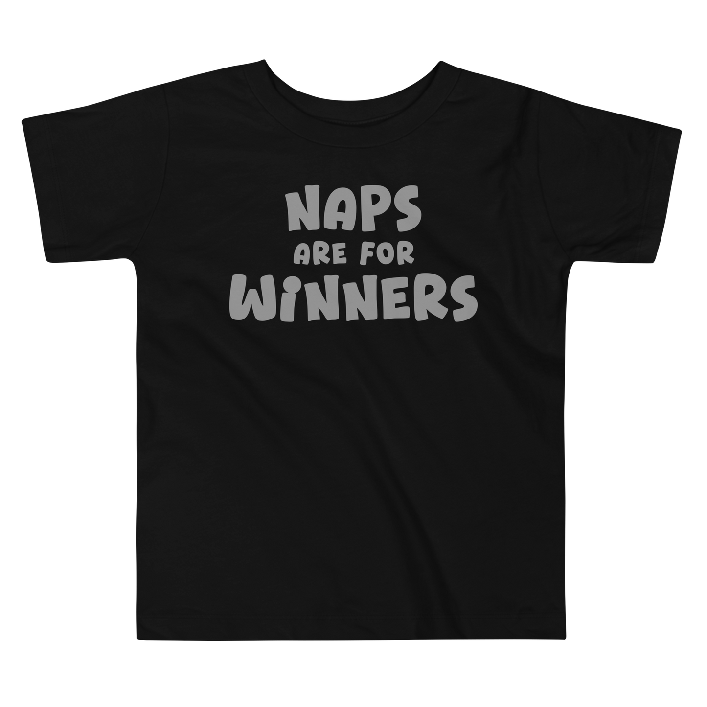 "Naps Are For Winners" printed on a black toddler short sleeve tee laying on a flat surface