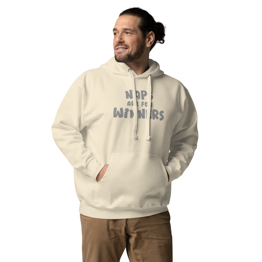 "Naps Are For Winners" printed on a bone unisex hoodie worn by a male
