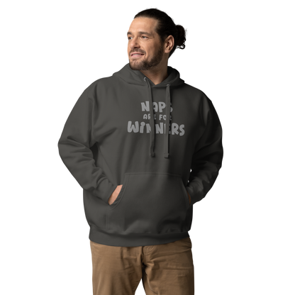"Naps Are For Winners" printed on a vintage black unisex hoodie worn by a male