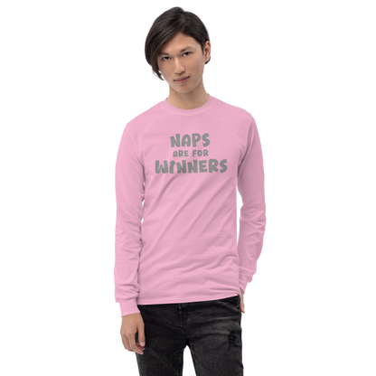 "Naps Are For Winners" printed on a light pink men's long sleeve shirt worn by a male