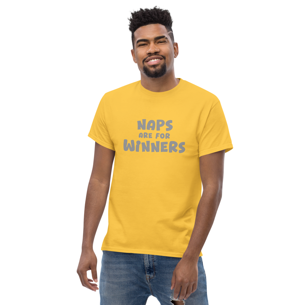 "Naps Are For Winners" printed on a daisy unisex classic tee worn by a male