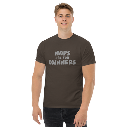 "Naps Are For Winners" printed on a dark chocolate unisex classic tee worn by a male