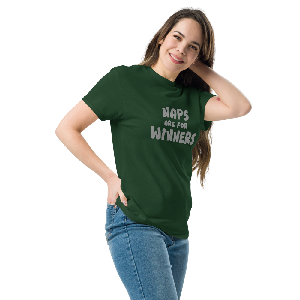 "Naps Are For Winners" printed on a forest green unisex classic tee worn by a female