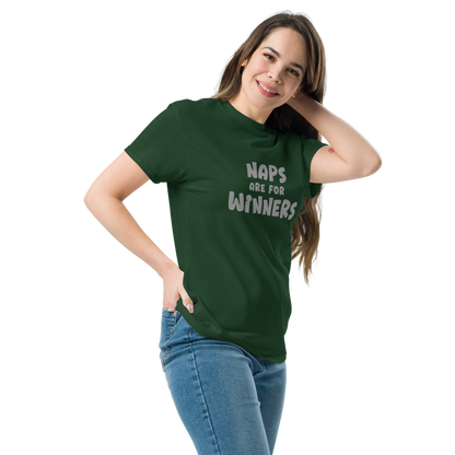 "Naps Are For Winners" printed on a forest green unisex classic tee worn by a female
