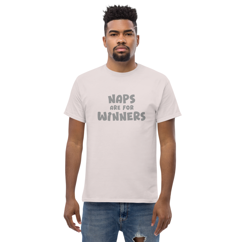 "Naps Are For Winners" printed on a ice grey unisex classic tee worn by a male