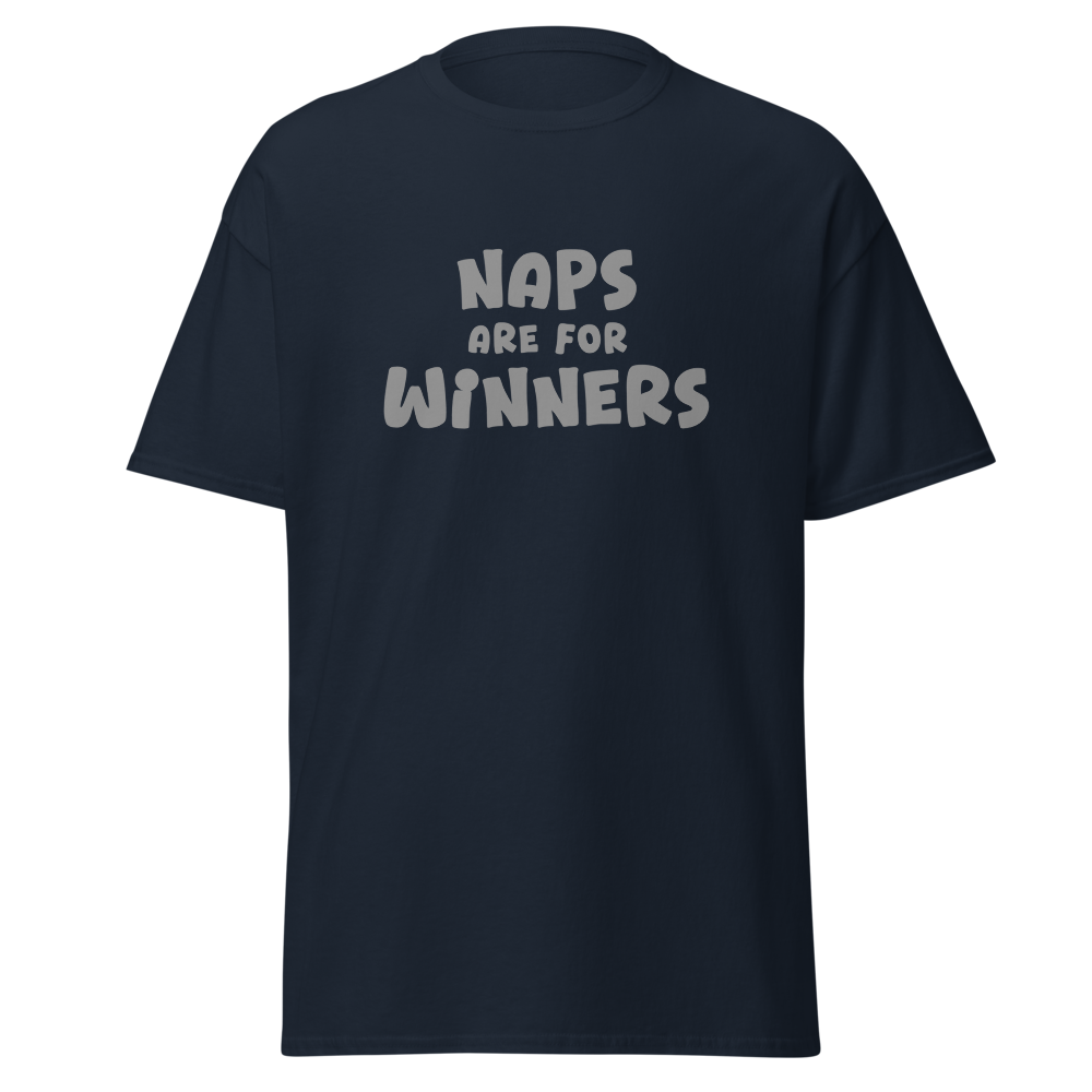 "Naps Are For Winners" printed on a navy unisex classic tee laying on a flat surface