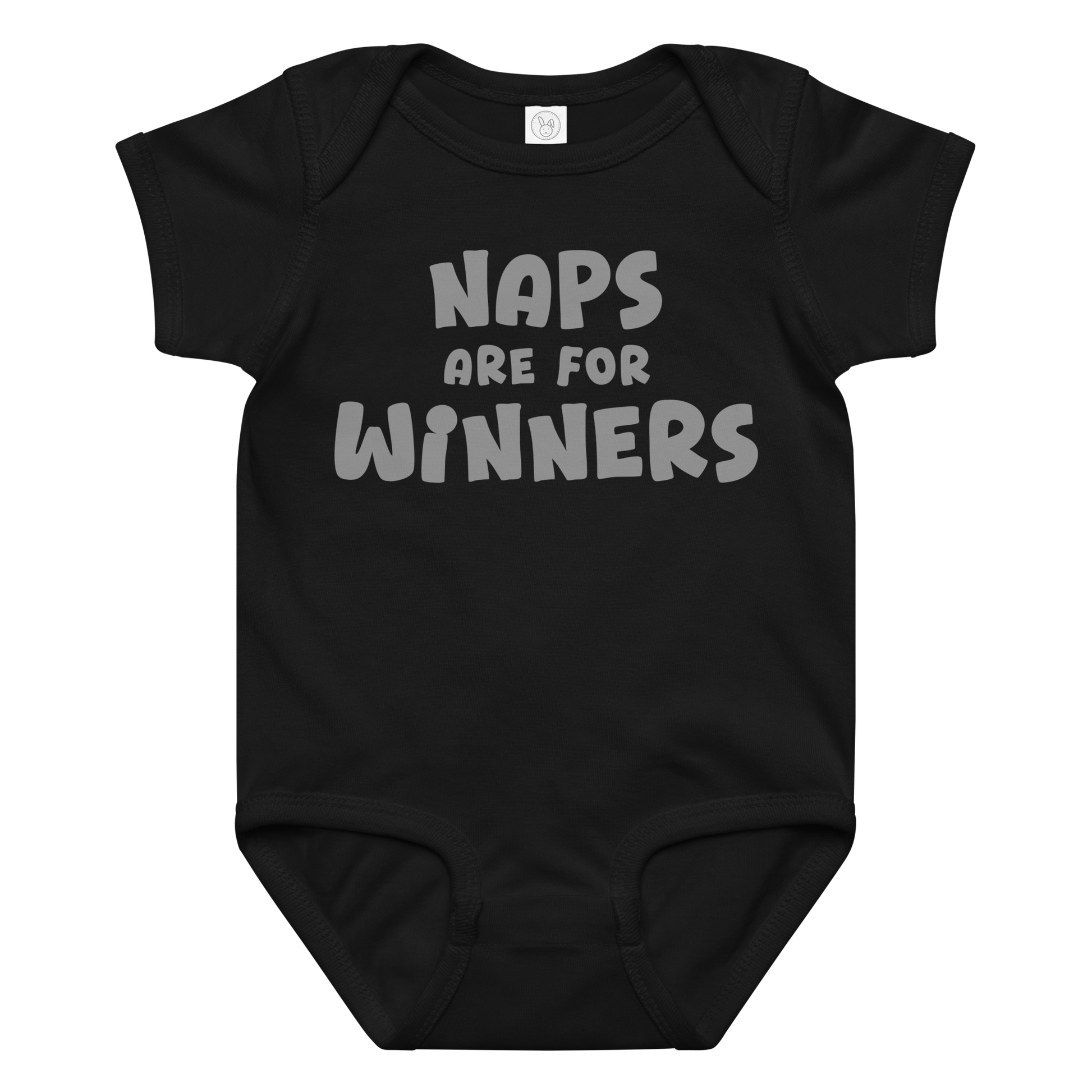 "Naps Are For Winners" printed on a black baby jersey bodysuit laying on a flat surface amongst other clothes