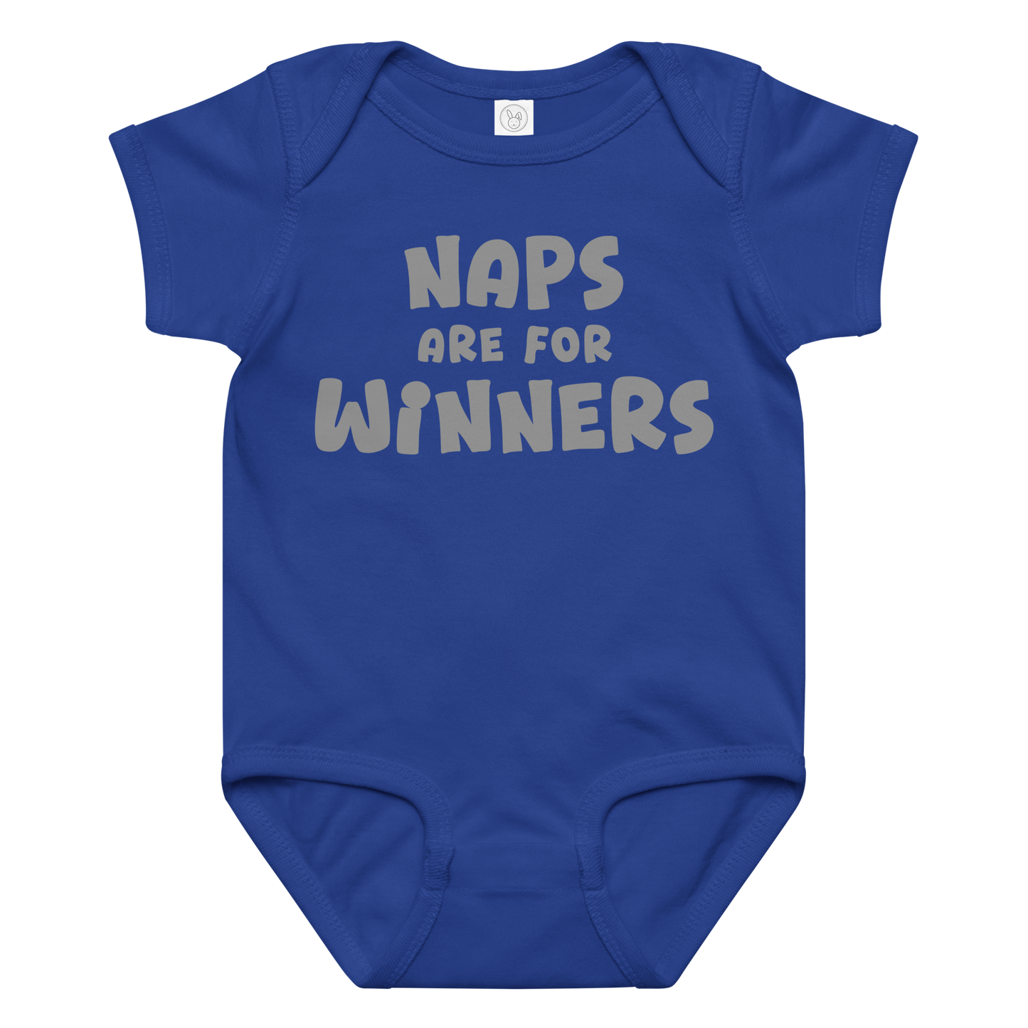 "Naps Are For Winners" printed on a royal baby jersey bodysuit laying on a flat surface amongst other clothes