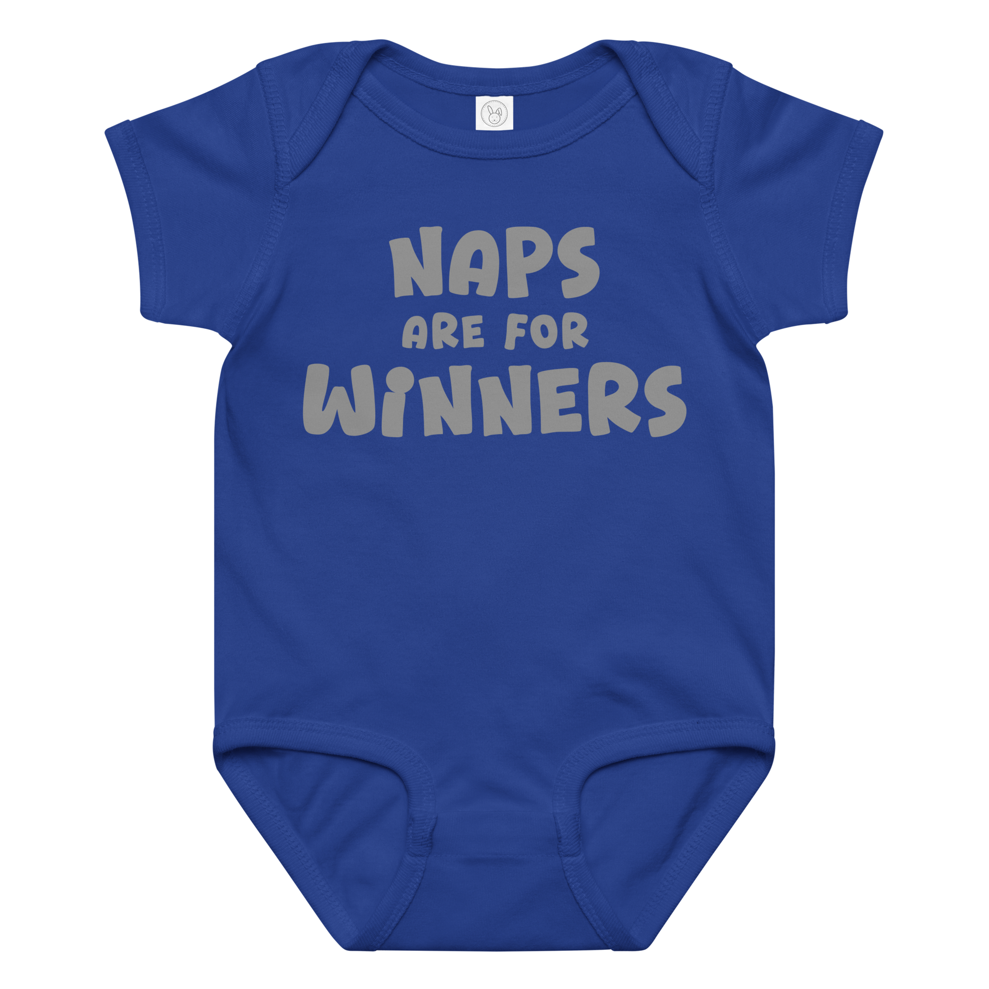 "Naps Are For Winners" printed on a royal baby jersey bodysuit laying on a flat surface amongst other clothes