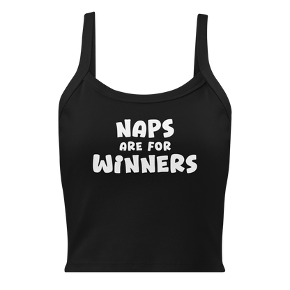 "Naps Are For Winners" printed on a solid black blend women's micro-rib tanktop laying on a flat surface